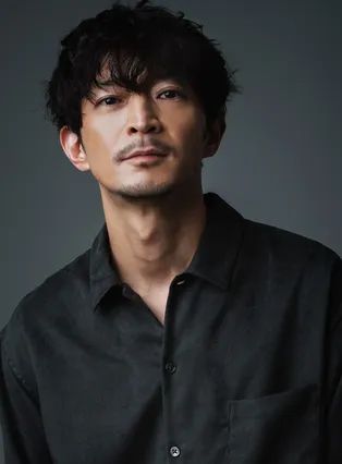 津田 健次郎の写真